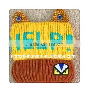 2015 fashion hot sale 100% Acrylic button striated print helip funny winter knitted hat