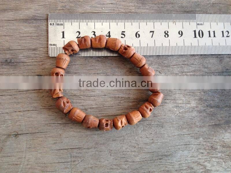 skull wood bead bracelet cheap beaded bracelet elastic wooden skull bead bracelet for promotion