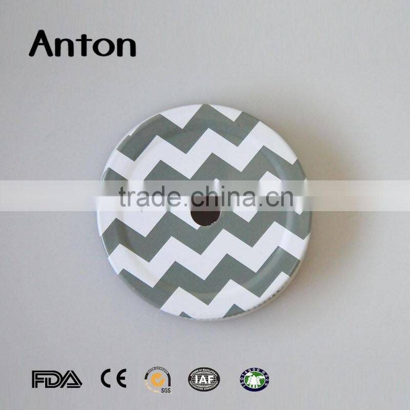 Yellow colored tin lid