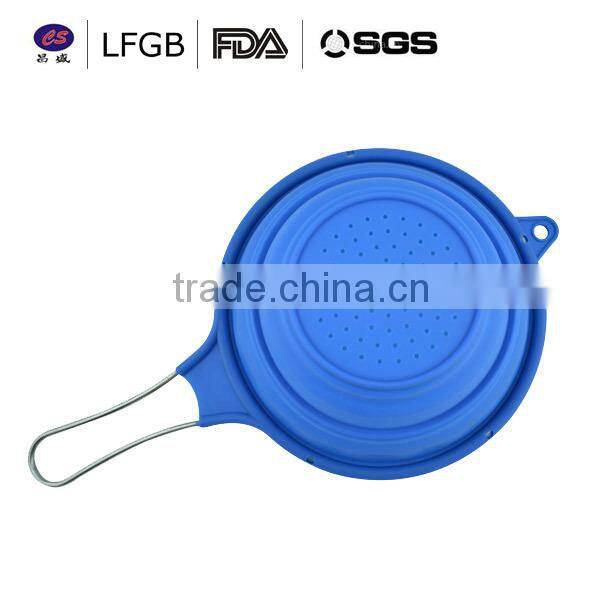 2014 New design fashionanble heat resistant silicone strainer spoon