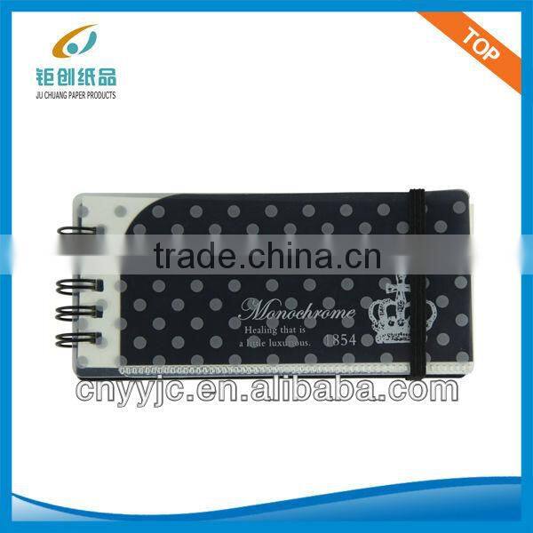 cardboard spiral notebook