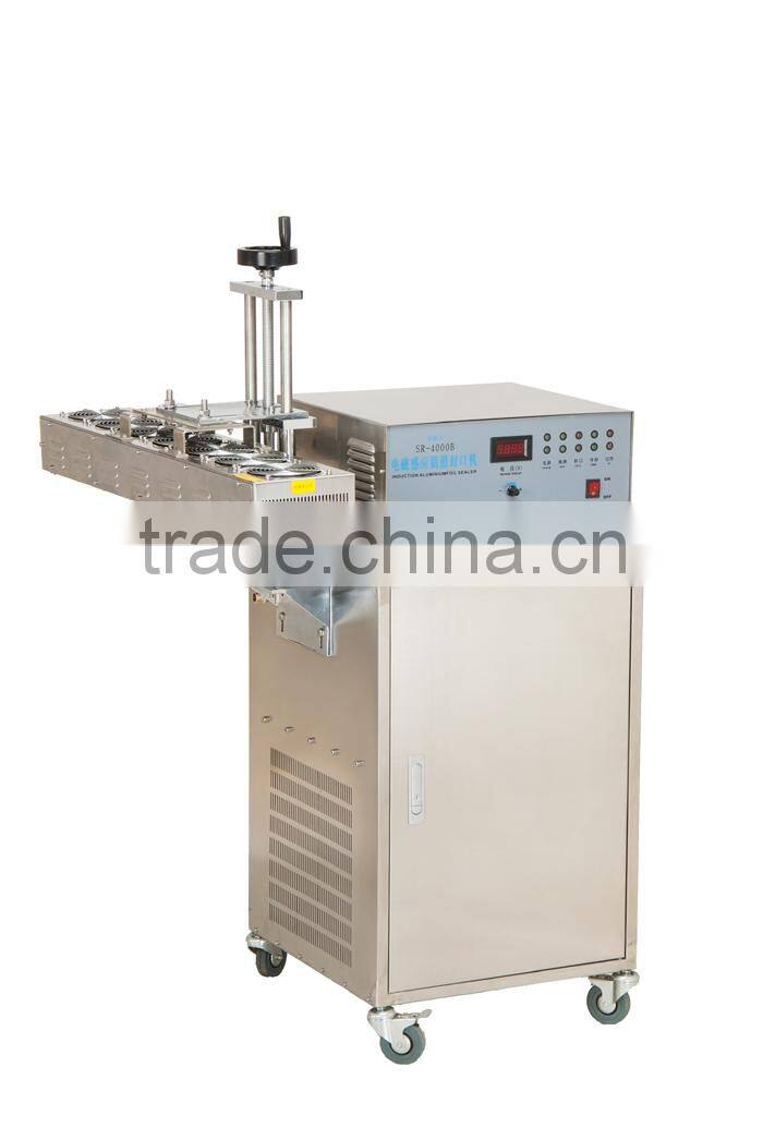 Aoutomstic aluminum foil sealing machine for medicine bottles