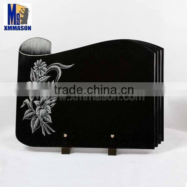 Black granite cemetery headstone