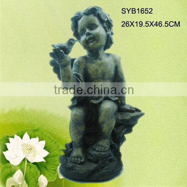 Hand carved outdoor children garden statue for sale.