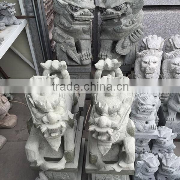 small granite lion statue