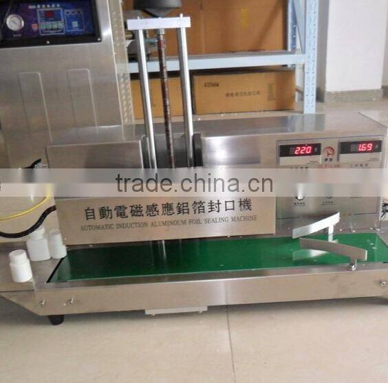 Automatic continuous electromagnetic induction aluminum foil jar heat sealing machine