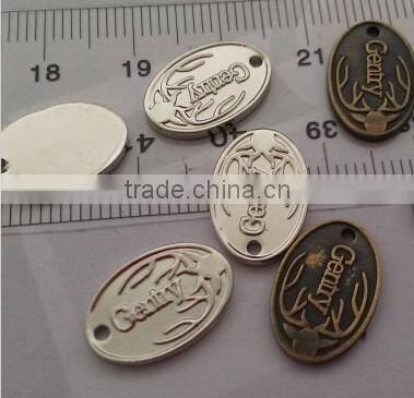 custom made oval engraved metal silver jewelry tags