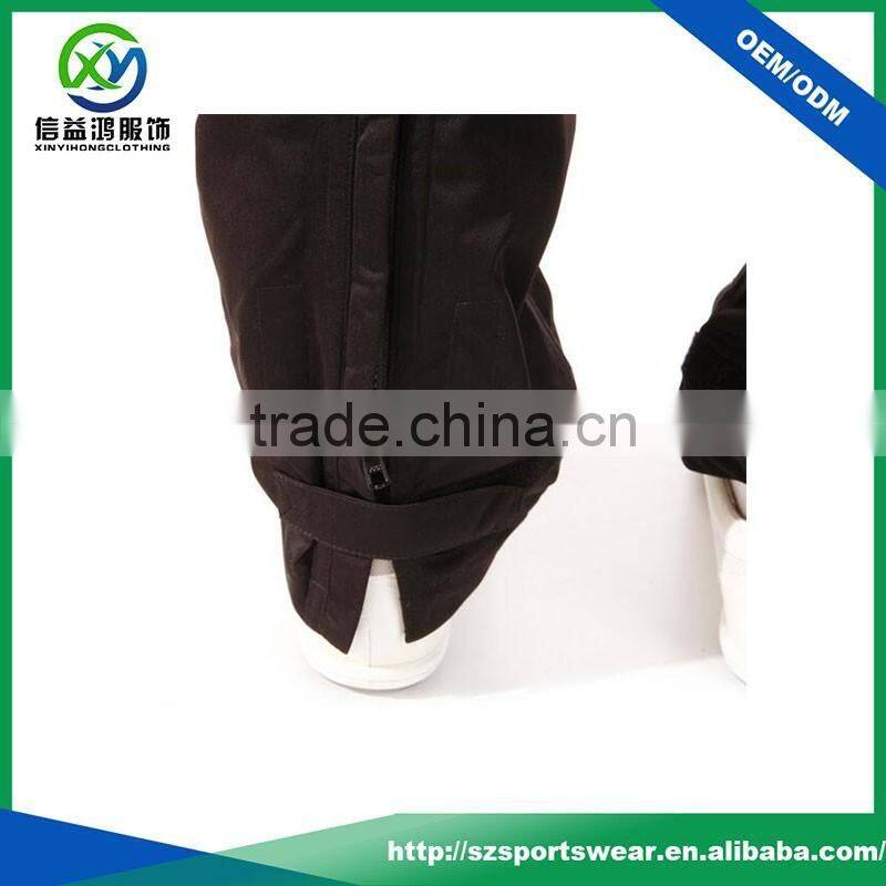 2016 Popular design black color 100% polyester waterproof adjustable leg golf pants ,track pant ,sports trousers for women