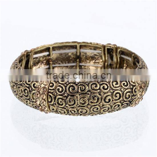 Engraved antique gold stretchy bracelet