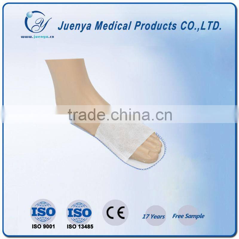 White nonwoven disposable slippers