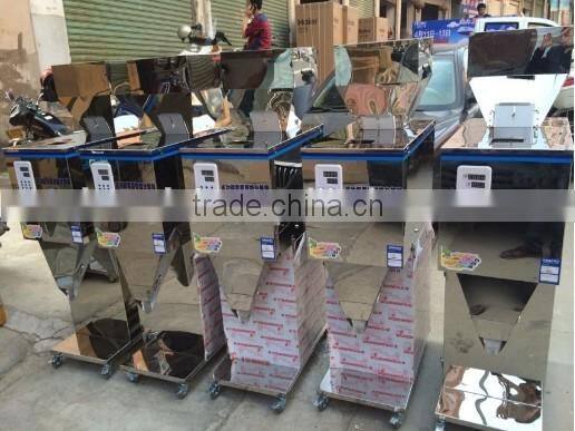 Semi-automatic Stainless steel weighing 10 -999 grams table type filling mchine