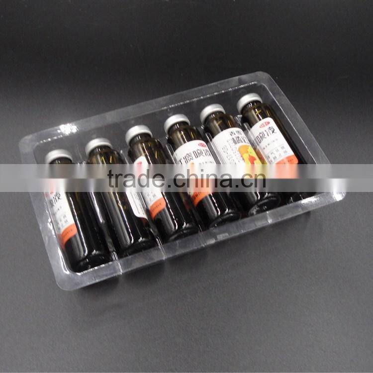 Clear blister disposable for medical vial packaging tray