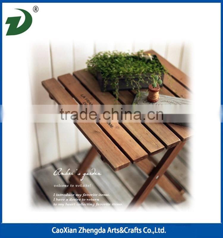 Solid wood folding round outdoor table