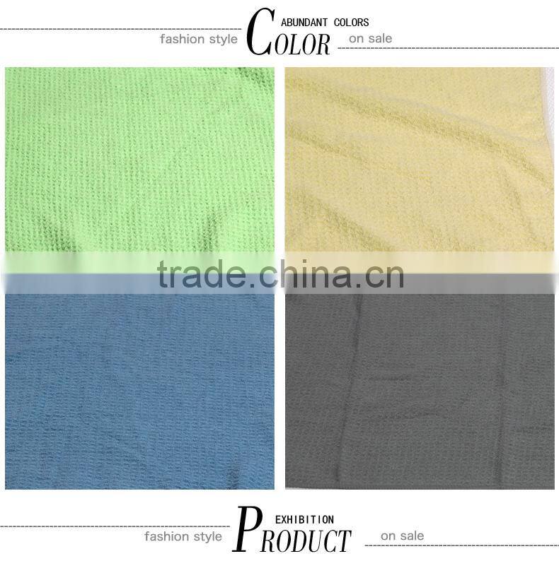 colorful towel with the grid for household cleaning