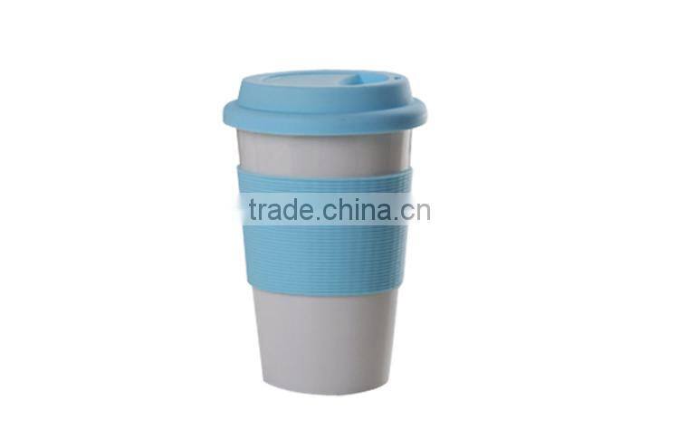 Wholesale porcelain promotional coffee mug white ceramic mug with silicone lid and sleeve
