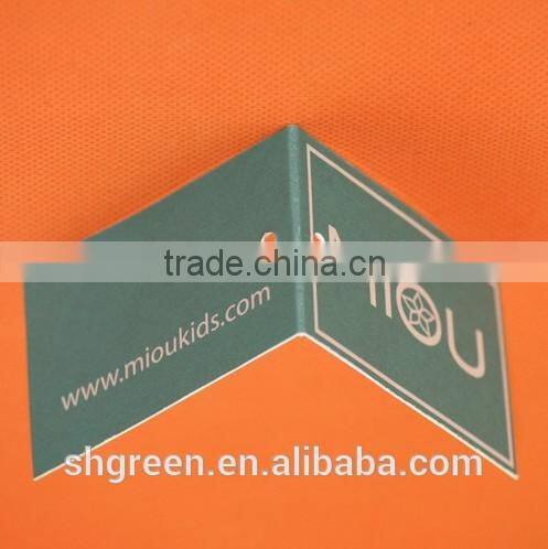 Center fold paper hangtag with plastic string tags for jeans denim