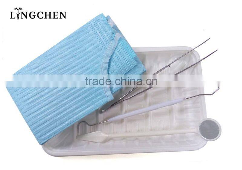 High quality Dental disposable package set have colorful waterproof dental bib,mouth mirror , probe, tweezer
