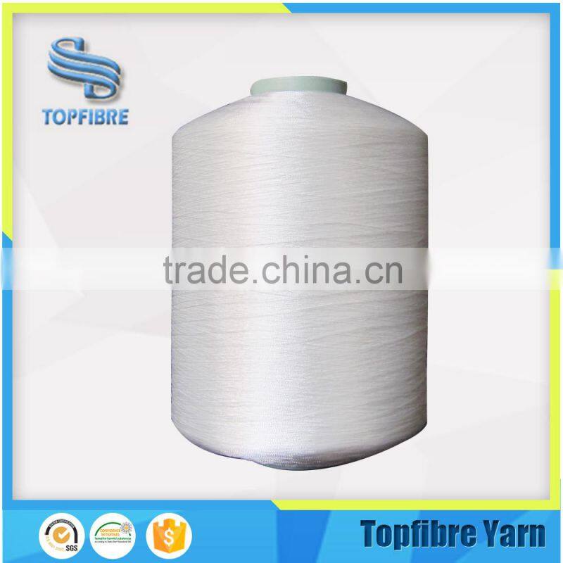 High Tenacity and Low Shrinkage Label Twist Covered Yarn