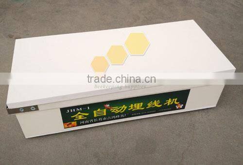 Electric wire embedder for beehive frame