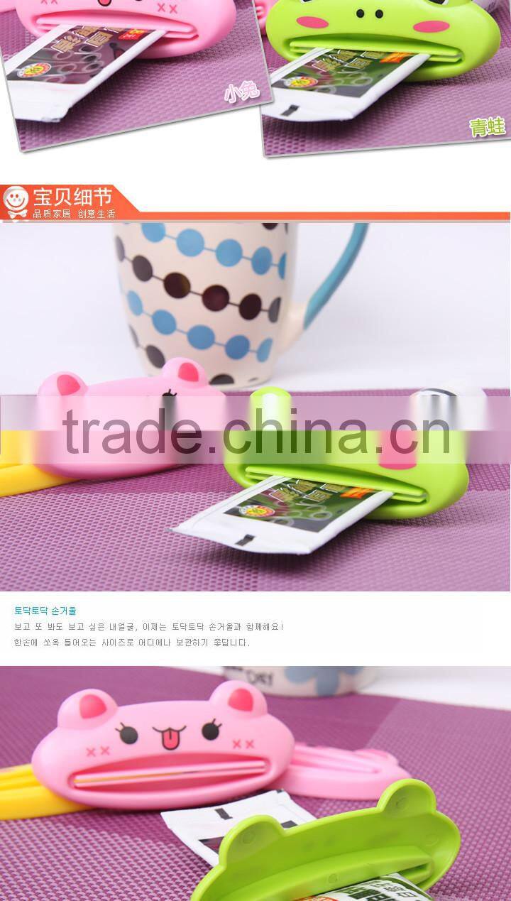 lovely cartoon toothpaste squeezer Dispenser Rolling Holder tools