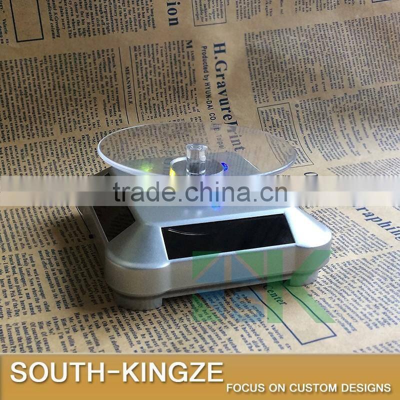 Silver Acrylic Watch/Jewelry/Camera Solar Power Rotating Display Stand