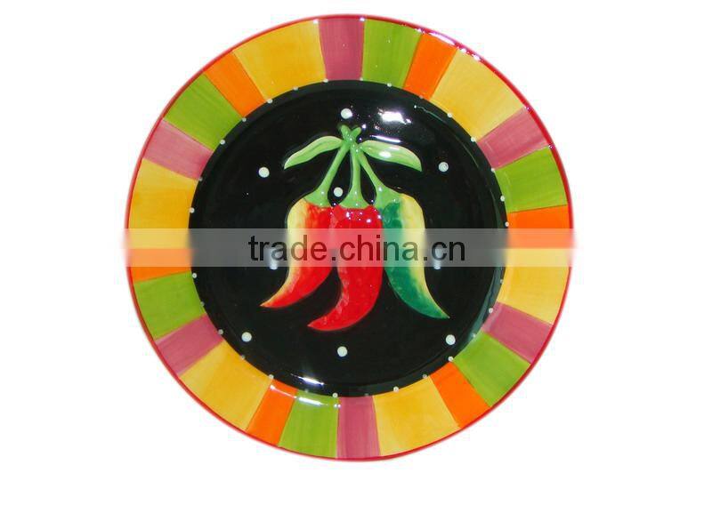 Colorful ceramic plates with hot pepper hand painted