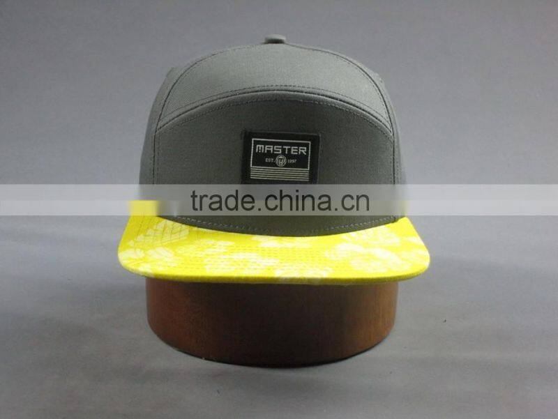 Custom cotton twill 7-panel snapback cap with embroidery logo