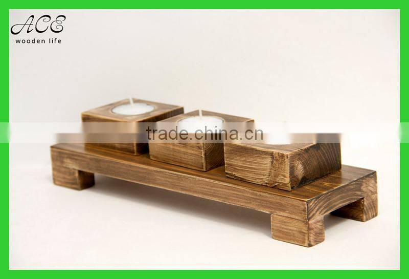 Antique wood candle holder