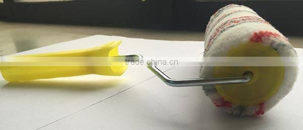 Patterned paint roller acrylic cover red/gray strip stick system roller frame