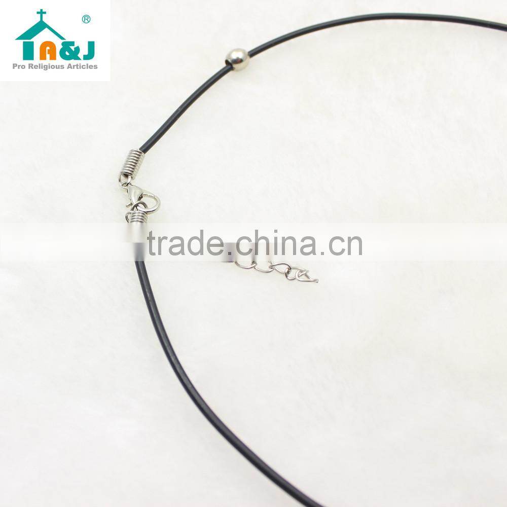 Antique brass cross cord pendant