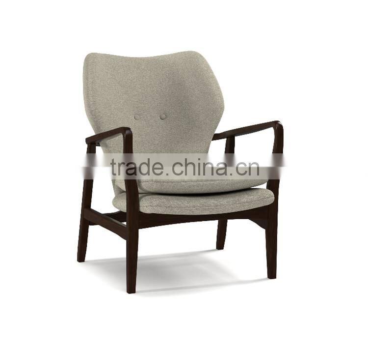 Mid-century walnut finished modern green fabric upholstered club chair with sleek polished wood arms