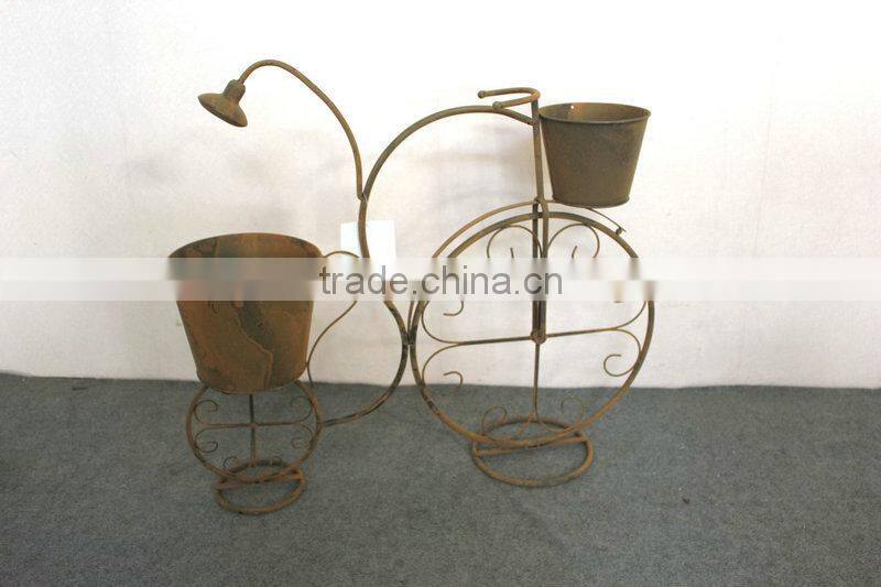 Plant holder with watering pot