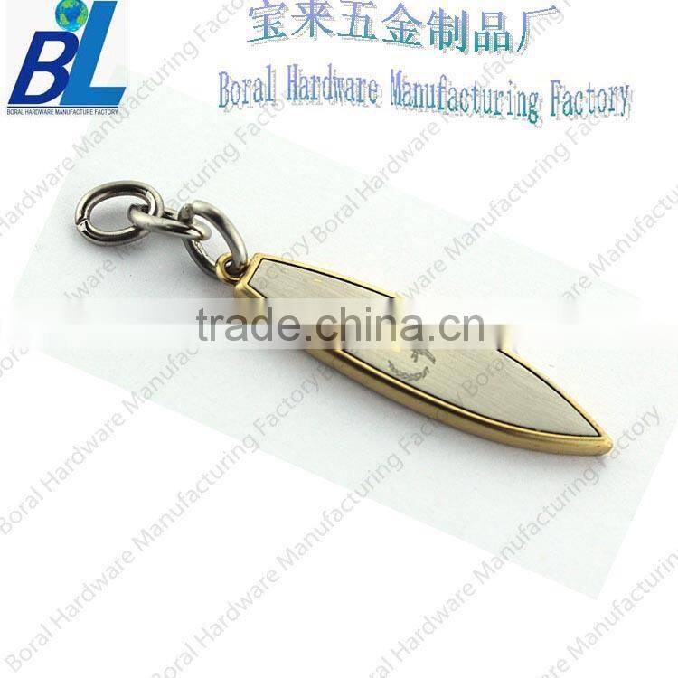 Two-tone engraved zipper slider for leather jackets