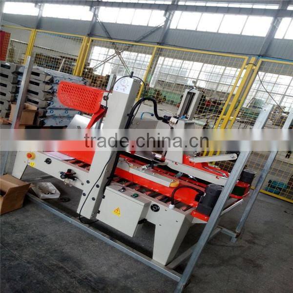Automatic box sealing machine, automatic carton box sealing machine, carton box packing machine