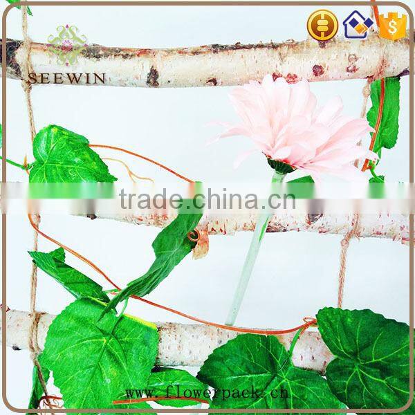 The rural custom festival decorates birch hemp rope ladder