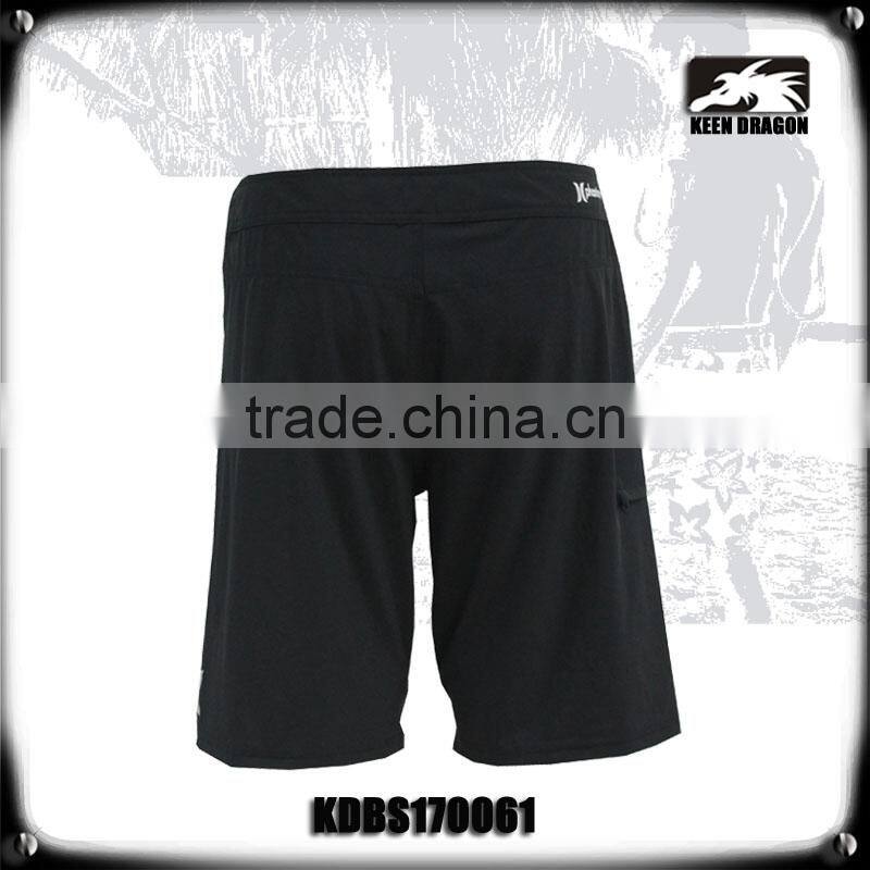 4 way stretch solid black board shorts