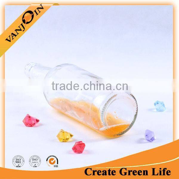 Transparent round shaped vodka glass bottle