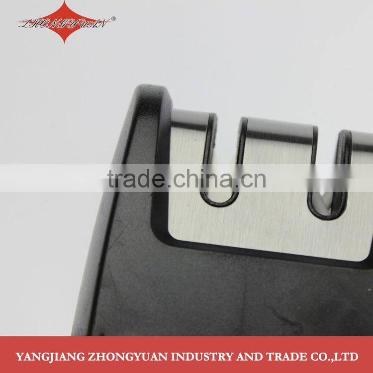 Unique design two-stage knife sharpener with stainless steel safety tray