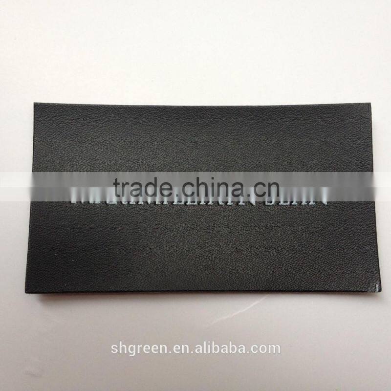 Soft debossed company name leather tags for suits