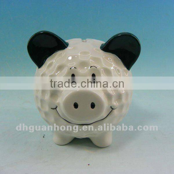 Ceramic money bank in sheep shape