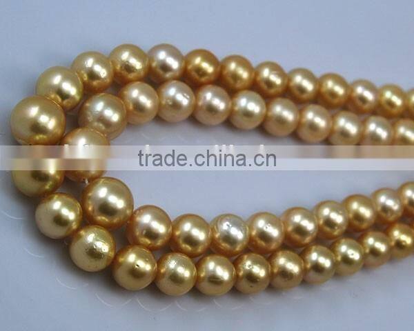 wholesale 11-11.5mm AA golden round south sea pearl strands
