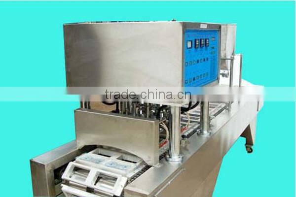 automatic plastic case filling and sealing machine