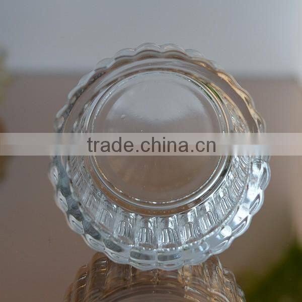 Glass candle container with round shaped for sale