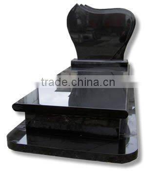 Black granite funeral tombstone