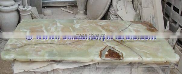 A GRADE LIGHT GREEN ONYX TABLE TOPS COLLECTION
