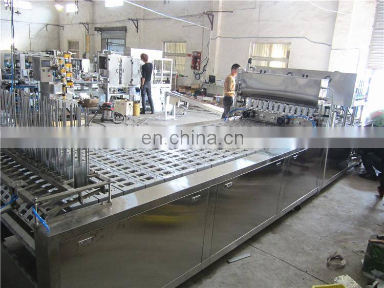 Automatic plastic cup sealing lid machine