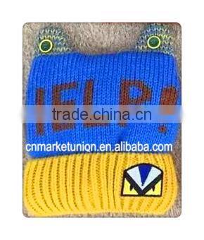 2015 fashion hot sale 100% Acrylic button striated print helip funny winter knitted hat