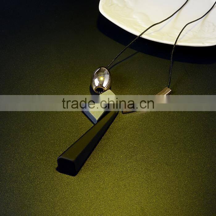 geometric wood bead pendant necklace gold curved tube bead black chain necklace geomotric rubber pendant long sweater necklace