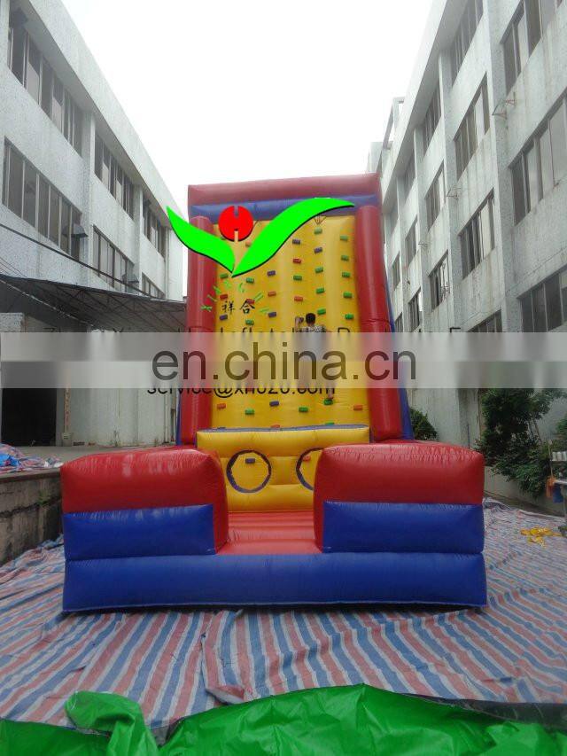 Inflatable climbing wall with obstacle course