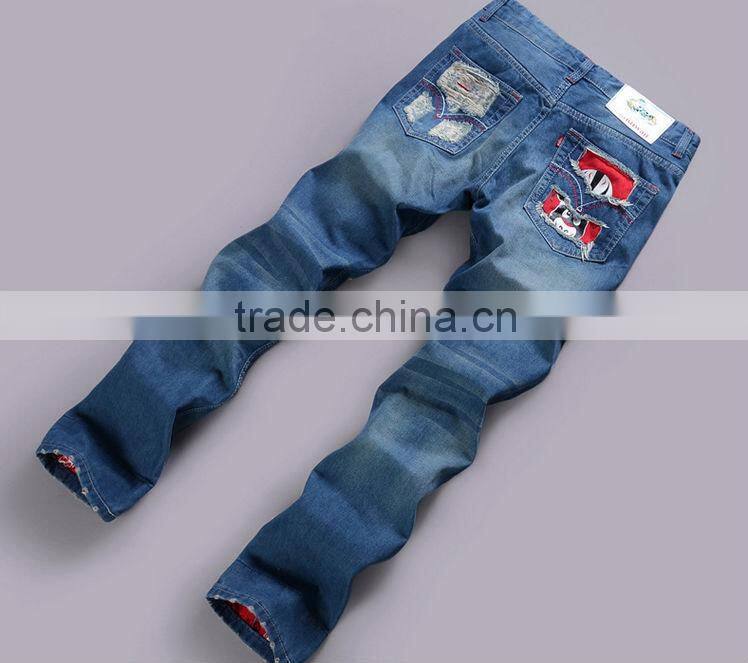 2015 Ripped Slim100% Cotton Jeans top fashion men designer jeans stock men stone washing hole blue jean trouser with opera face